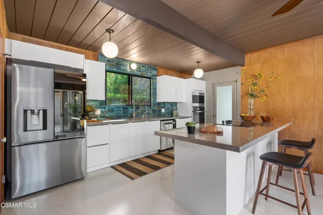 a lobby with furniture and garden