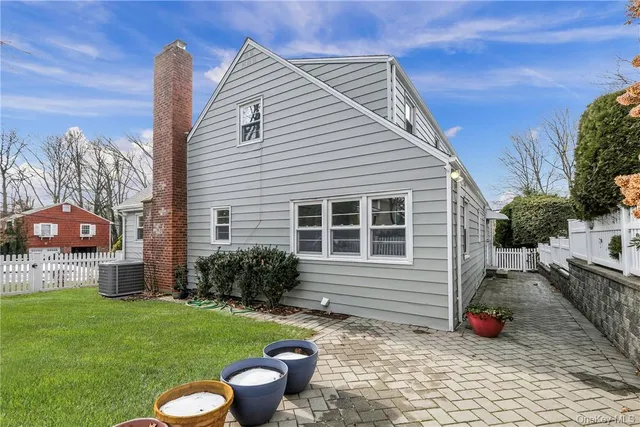 a view of a park with large trees