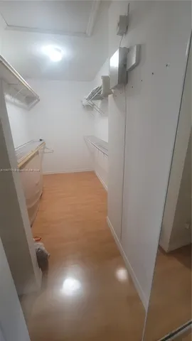 a view of a room with racks on the wall