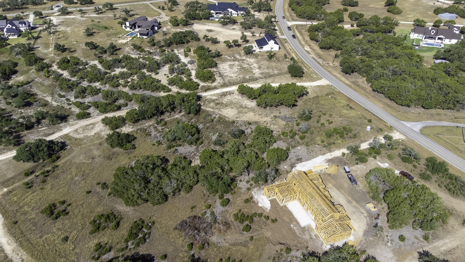 2251 West Fitzhugh Road Dripping Springs, TX 78620 - Photo 13 of 16 a view of a dry yard with wooden fence