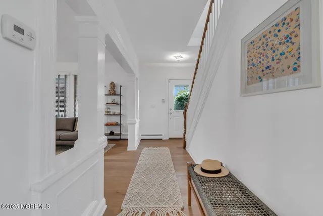 a view of room with walk in closet and window