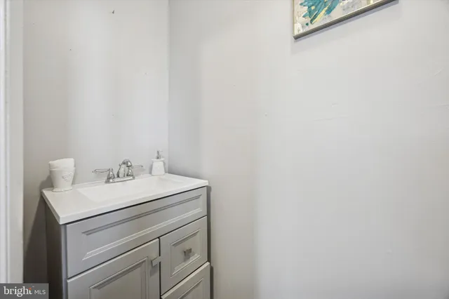 a bathroom with a sink and a vanity