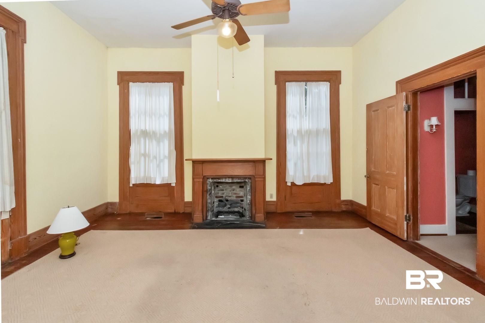 959 Dauphin Street Mobile, AL 36604 - Photo 15 of 43 Unfurnished living room with carpet flooring and ceiling fan