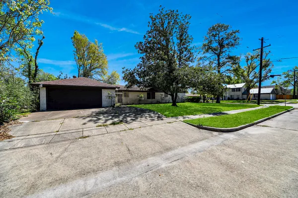 a view of a backyard with a garden
