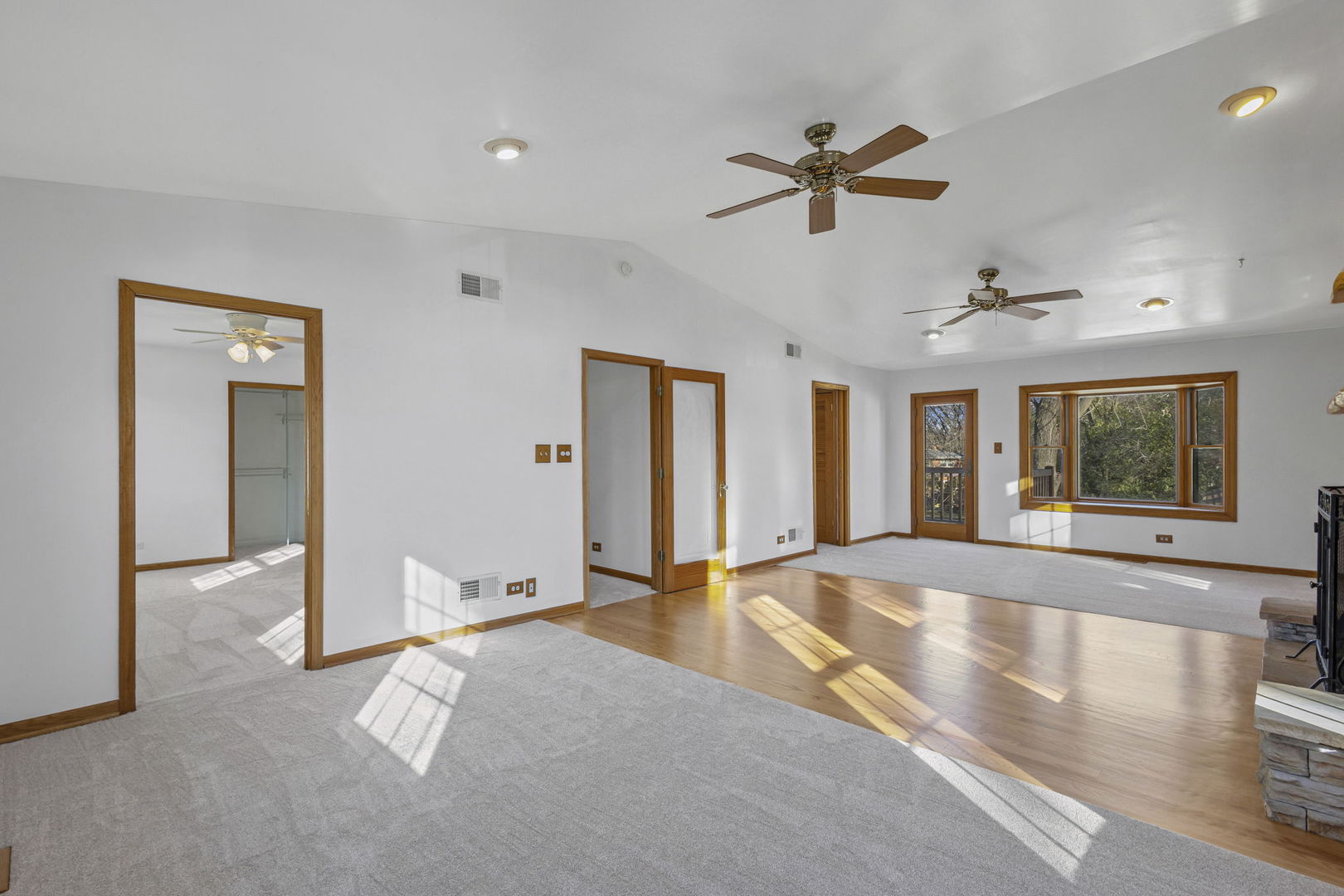 1323 South Roselle Road Schaumburg, IL 60193 - Photo 35 of 51 a view of an empty room with window and ceiling fan