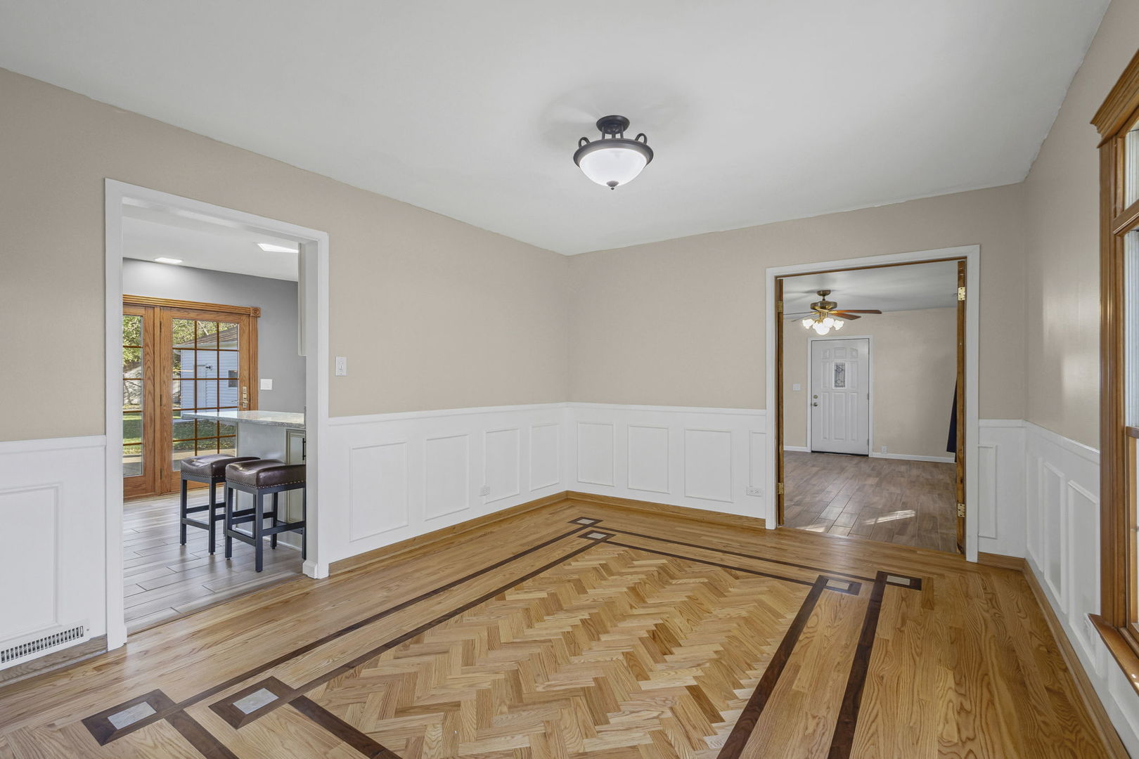 1323 South Roselle Road Schaumburg, IL 60193 - Photo 10 of 51 a view of a livingroom with wooden floor and furniture
