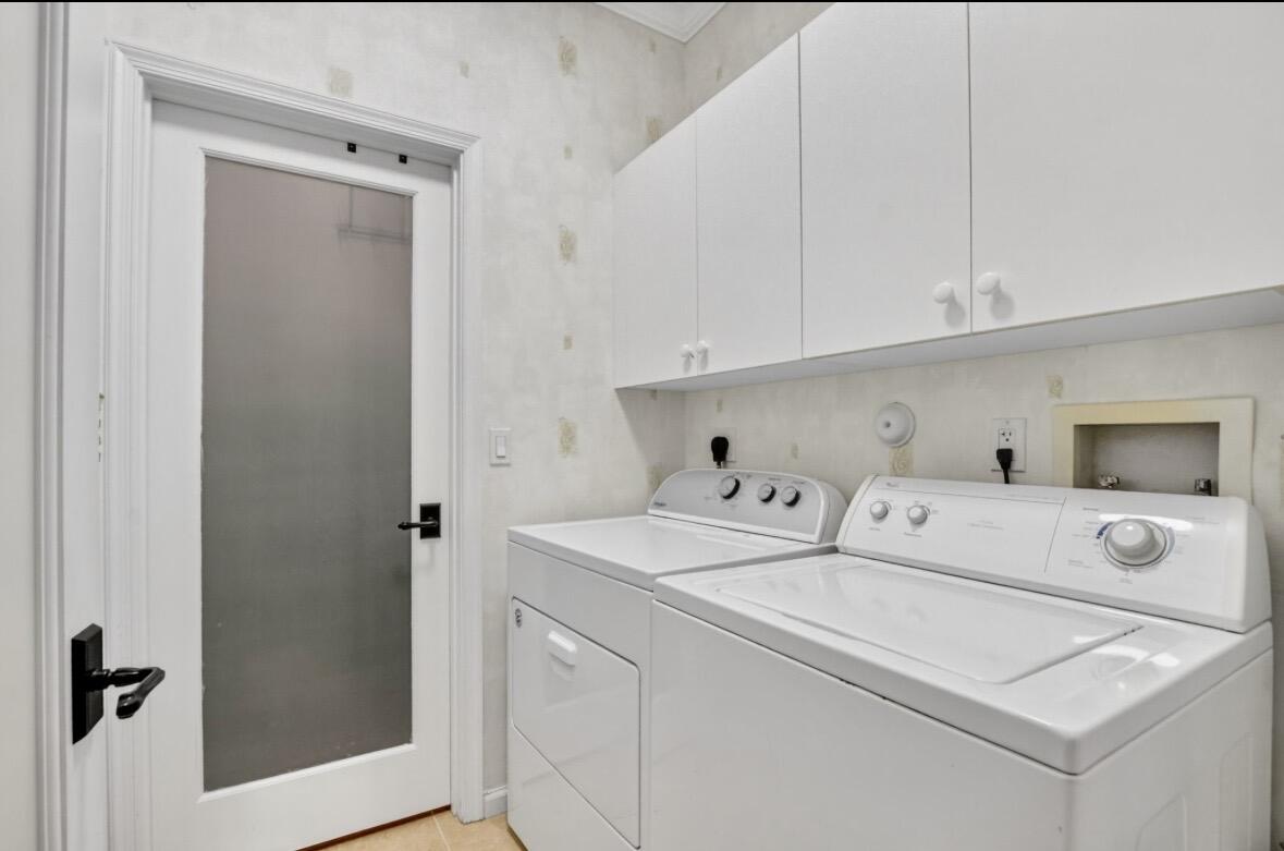 7879 Monarch Court Delray Beach, FL 33446 - Photo 30 of 74 a utility room with dryer and washer