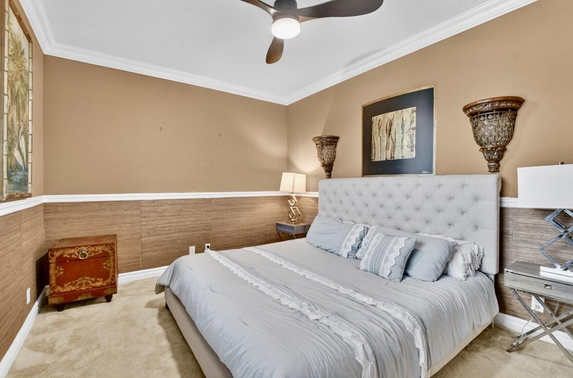 7879 Monarch Court Delray Beach, FL 33446 - Photo 43 of 74 a bedroom with a bed and window