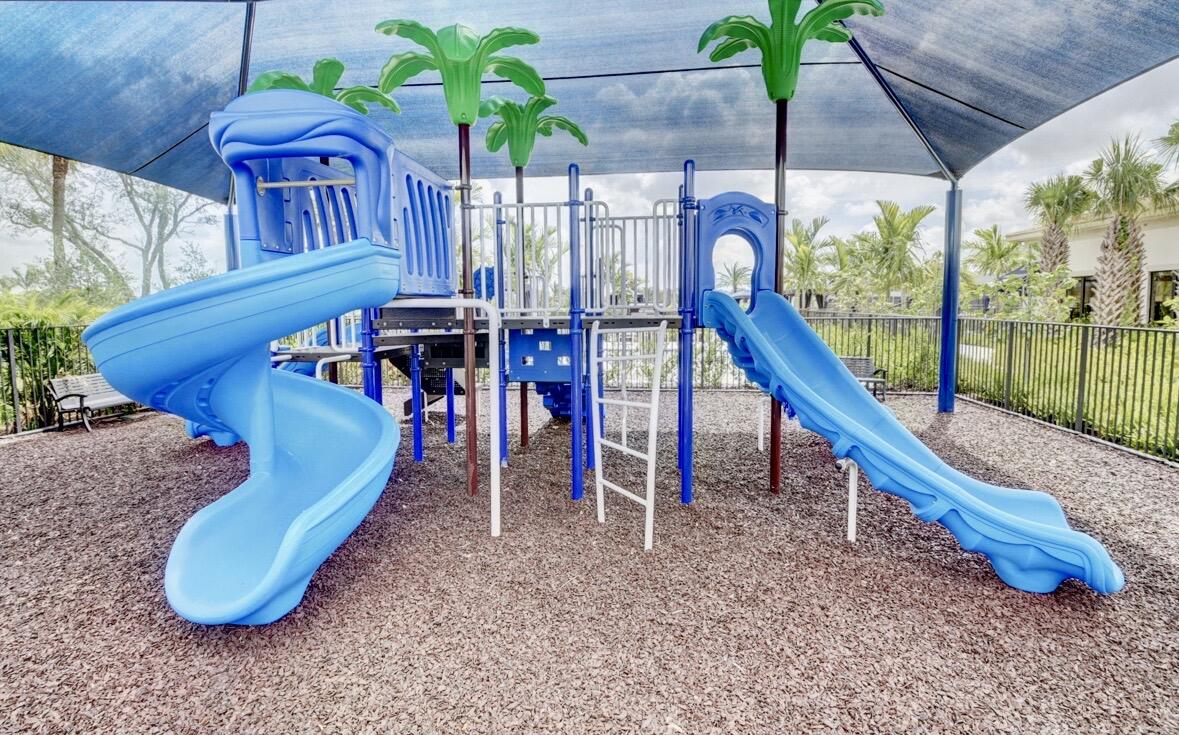 7879 Monarch Court Delray Beach, FL 33446 - Photo 54 of 74 a view of a park with a slide