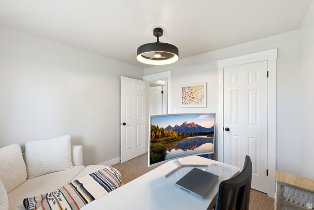 1405 Vintry Lane Murray, UT 84121 - Photo 22 of 44 Room with light gray walls, white trim, and light beige carpet