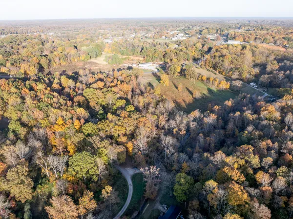 an aerial view of residential house with parking space