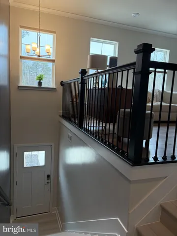 a view of hallway with windows