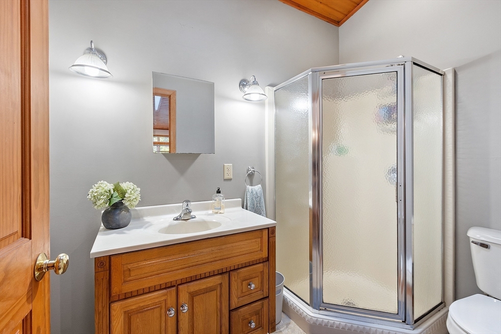 1249 Richardson Road Ashby, MA 01431 - Photo 24 of 31 a bathroom with a sink a toilet and shower