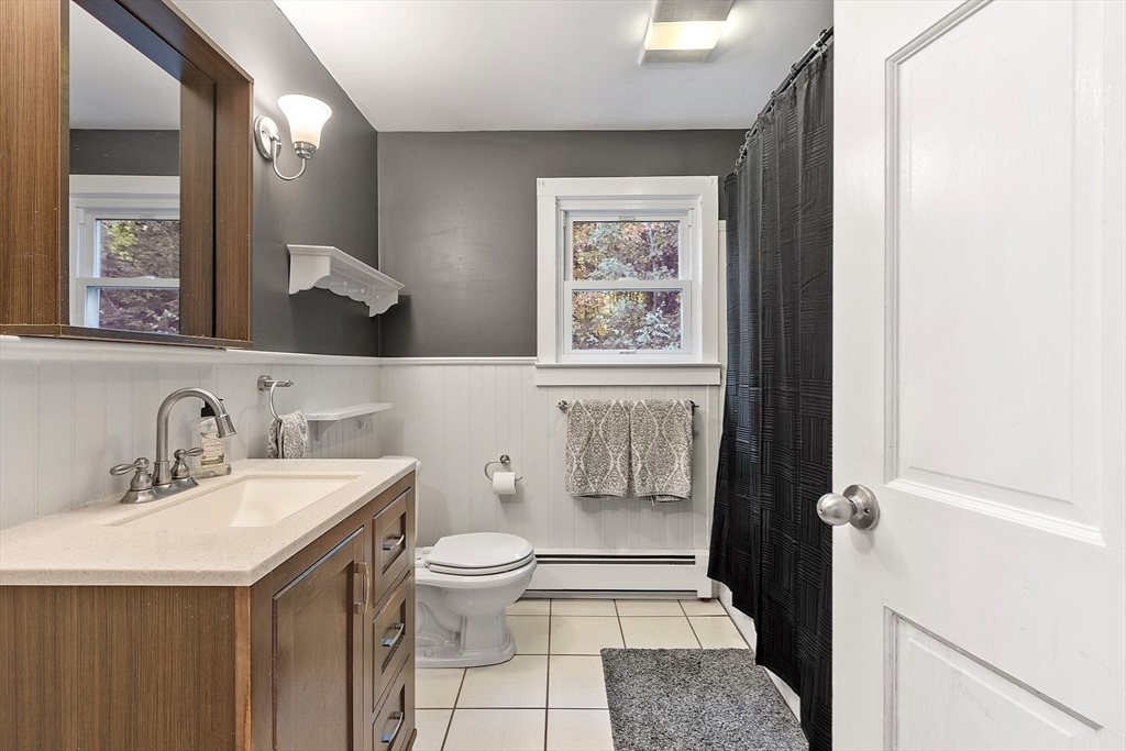 1249 Richardson Road Ashby, MA 01431 - Photo 7 of 31 a bathroom with a sink toilet and shower
