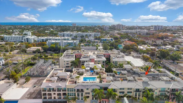 an aerial view of a houses with outdoor space
