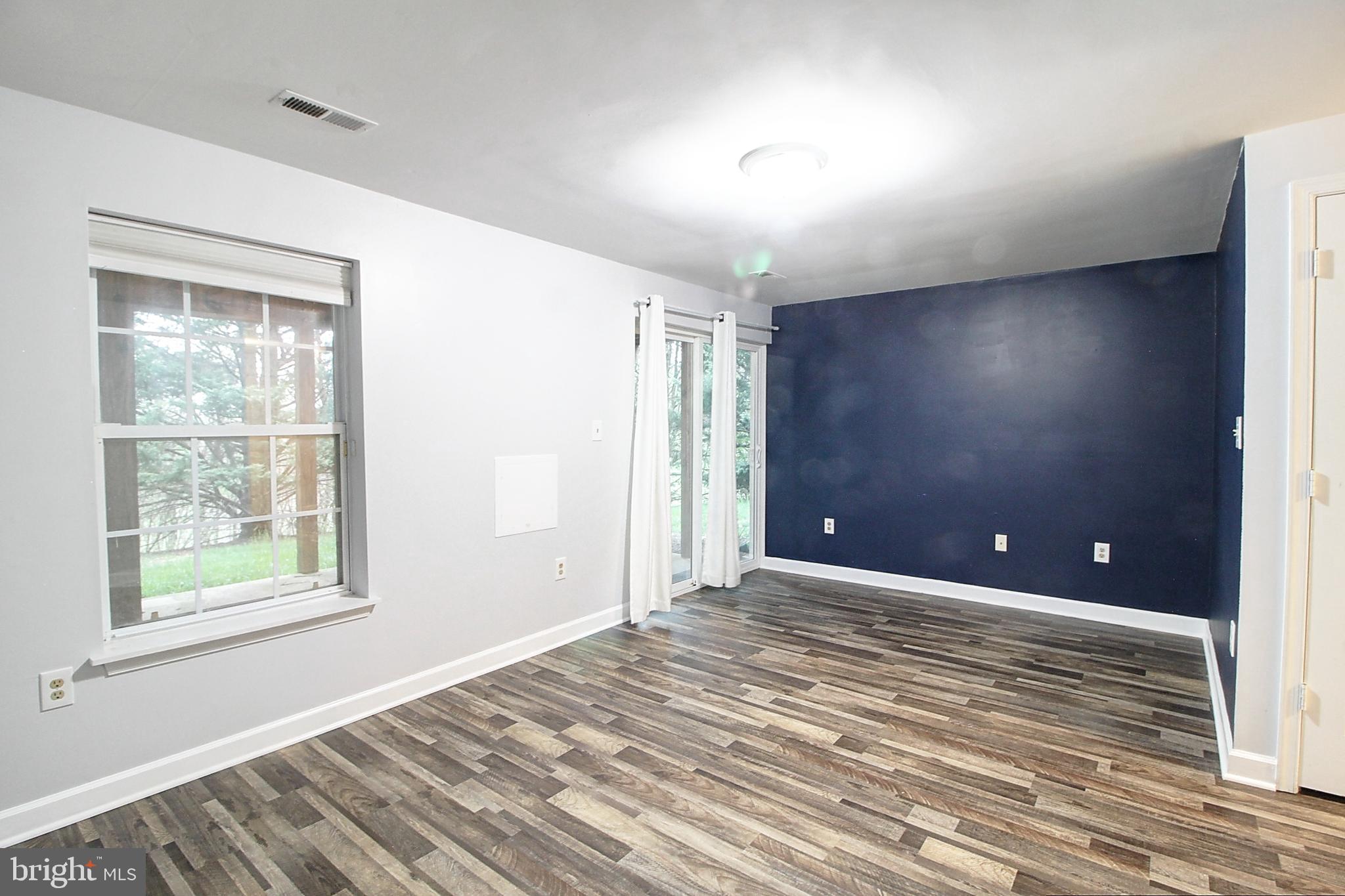 9261 Ridgefield Circle Frederick, MD 21701 - Photo 21 of 27 an empty room with windows and closet