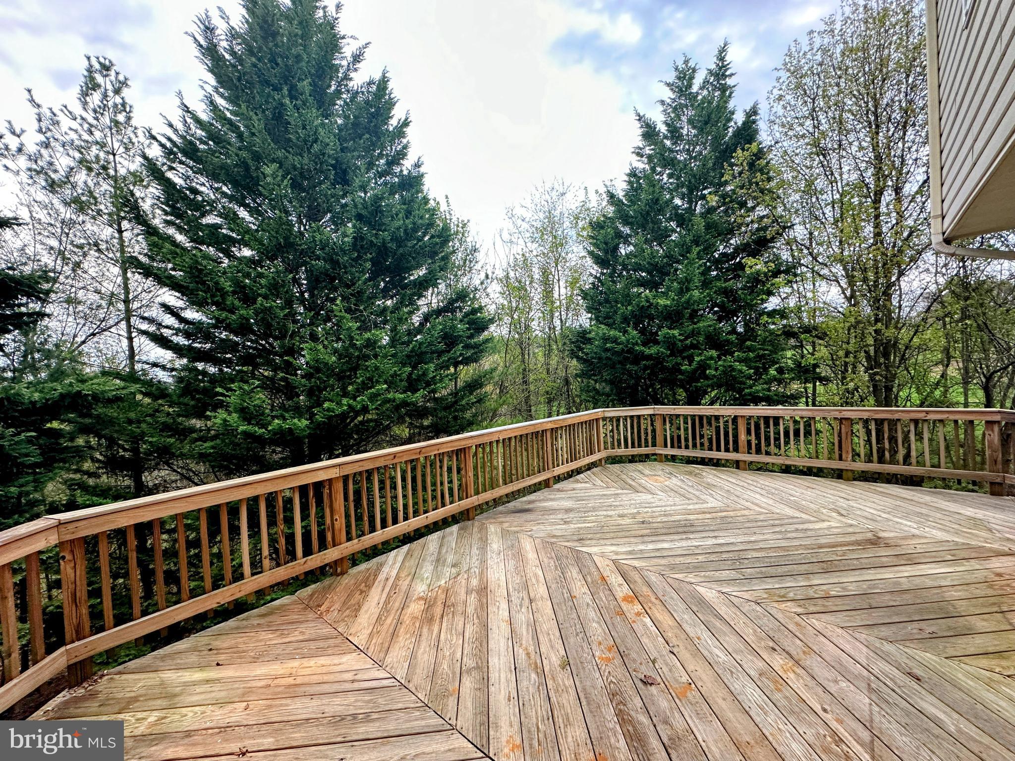 9261 Ridgefield Circle Frederick, MD 21701 - Photo 24 of 27 a view of balcony with wooden floor and fence