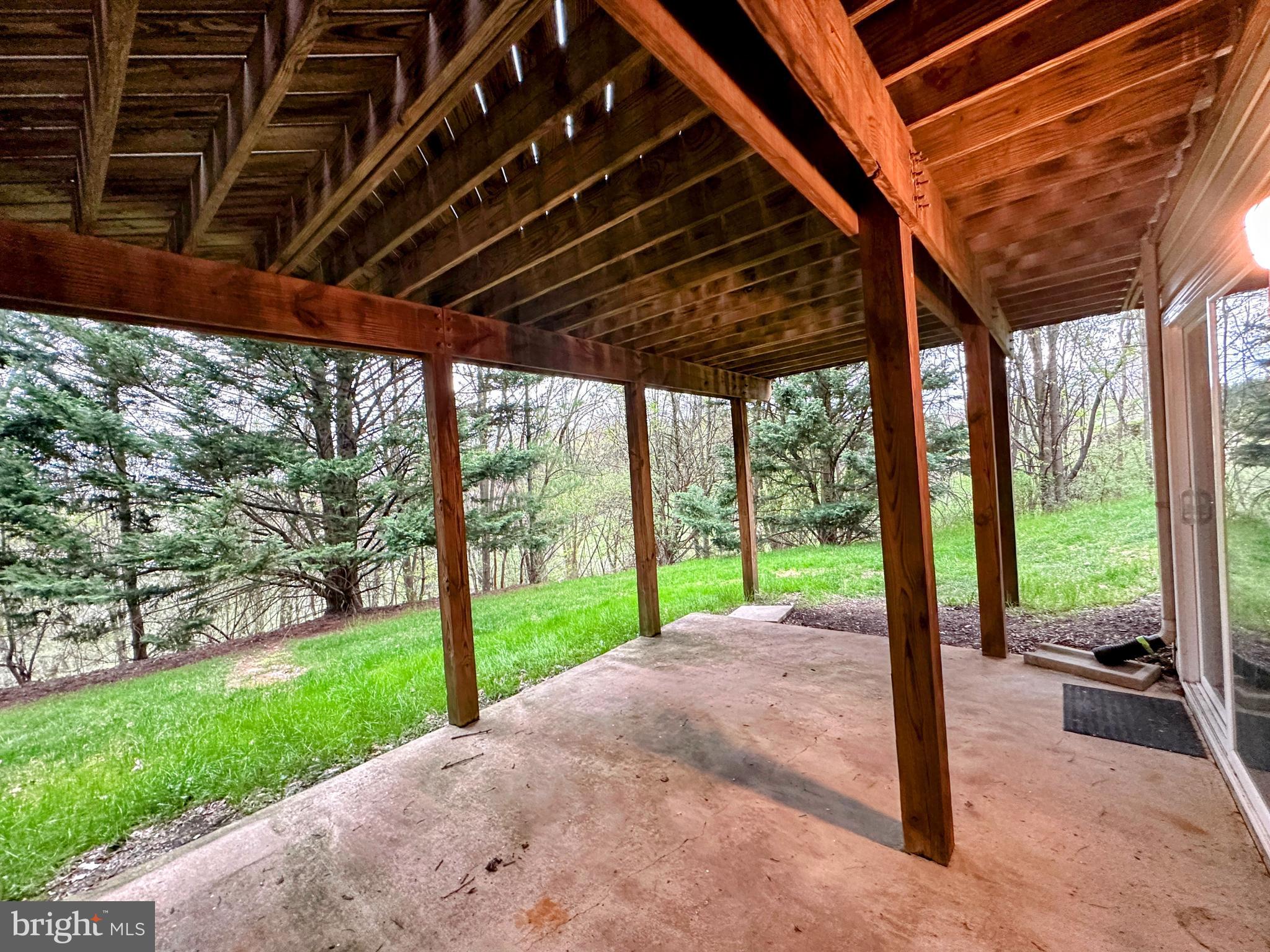 9261 Ridgefield Circle Frederick, MD 21701 - Photo 25 of 27 a view of a porch with a yard