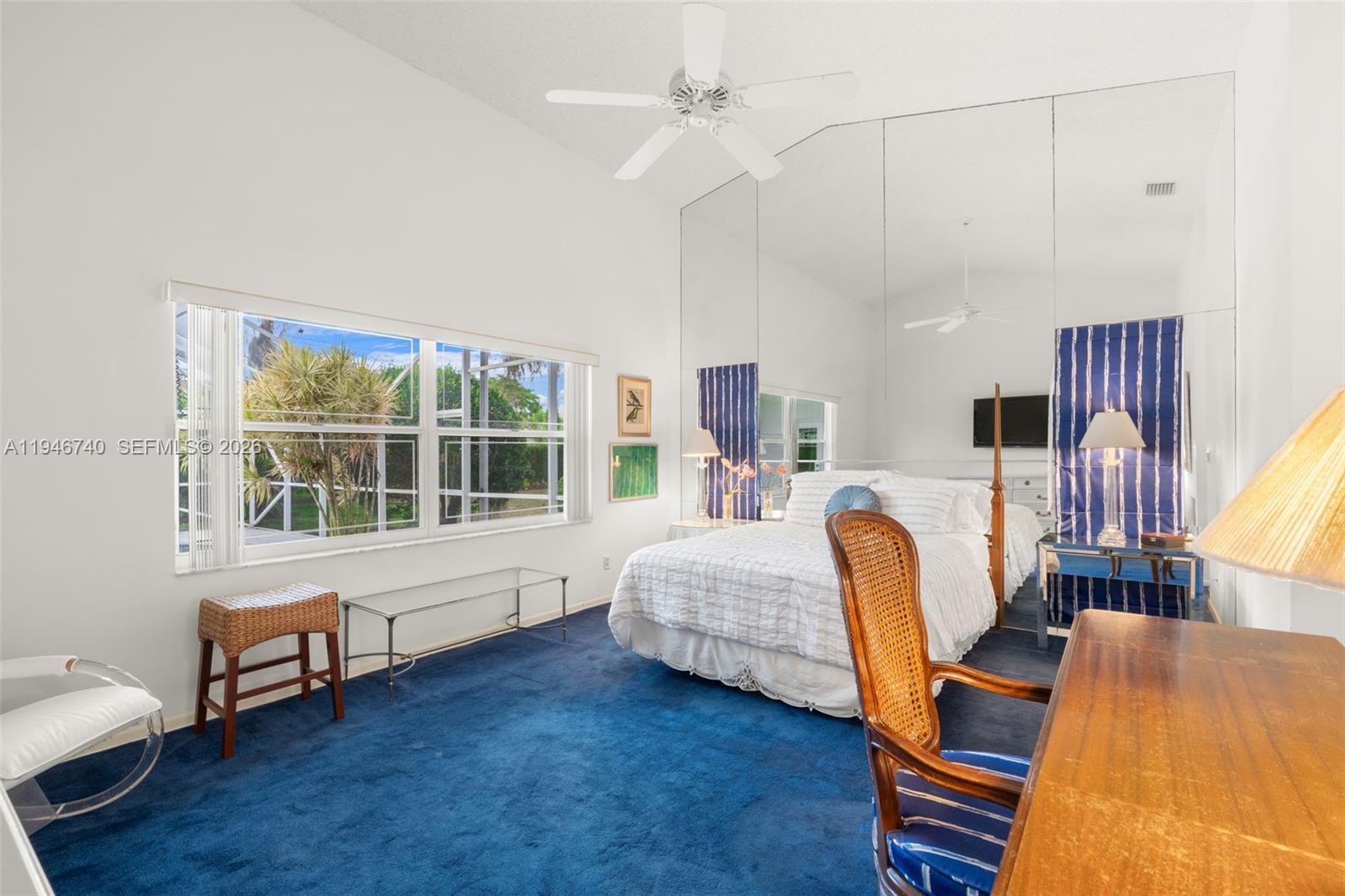 7901 Northwest 86th Terrace Tamarac, FL 33321 - Photo 19 of 42 a living room with furniture and a window