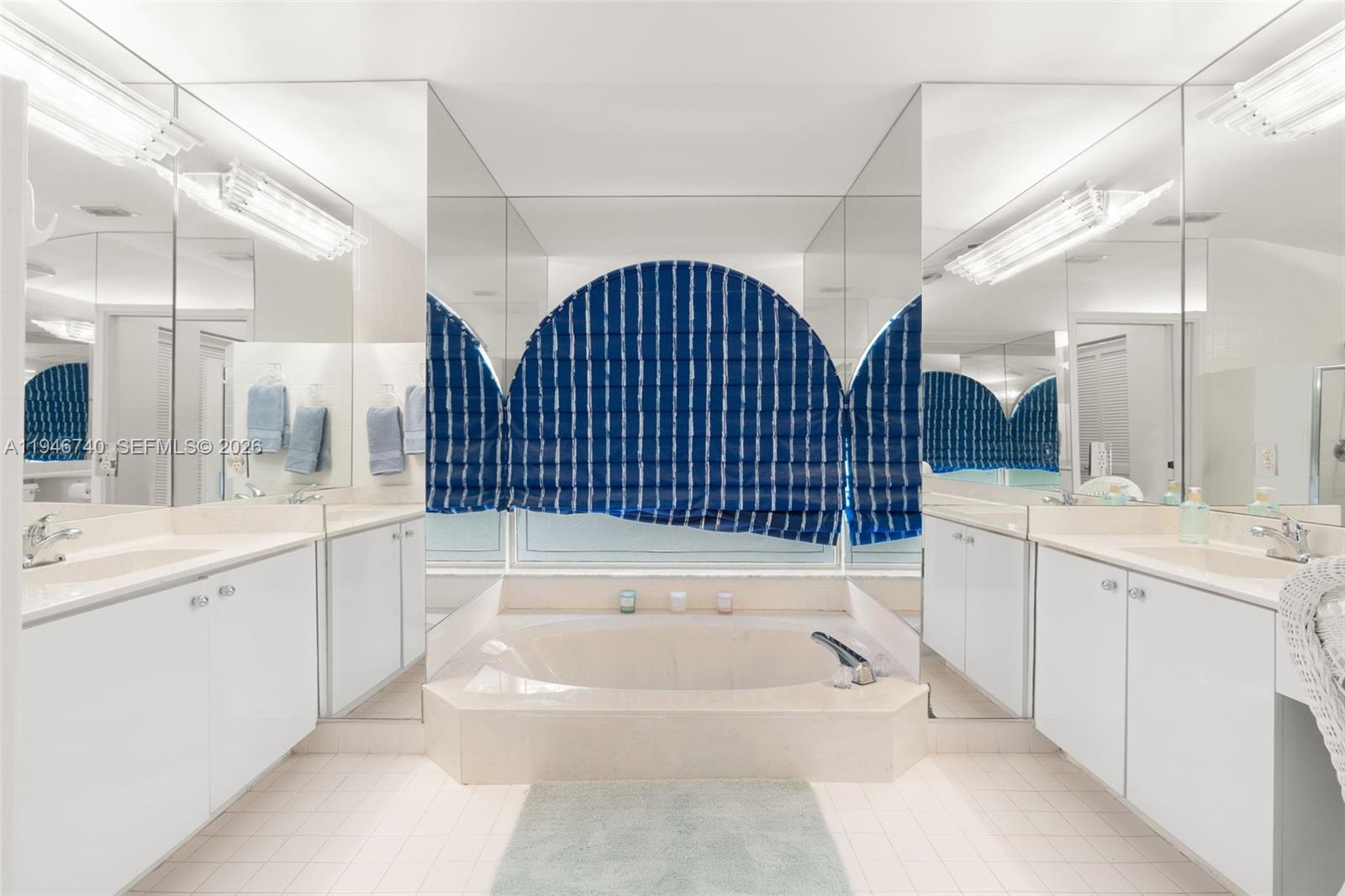 7901 Northwest 86th Terrace Tamarac, FL 33321 - Photo 23 of 42 a bathroom with a bathtub and a sink