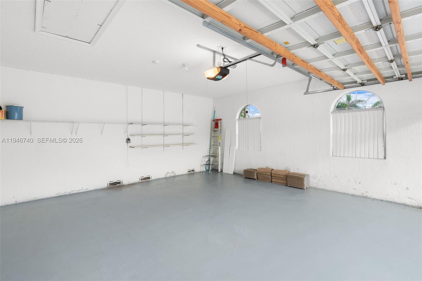 7901 Northwest 86th Terrace Tamarac, FL 33321 - Photo 29 of 42 a view of a room with storage and racks