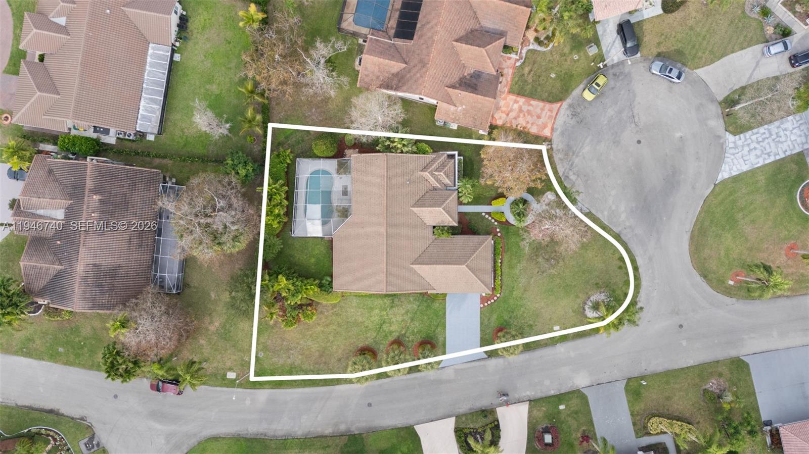 7901 Northwest 86th Terrace Tamarac, FL 33321 - Photo 36 of 42 an aerial view of a house with outdoor space and a swimming pool