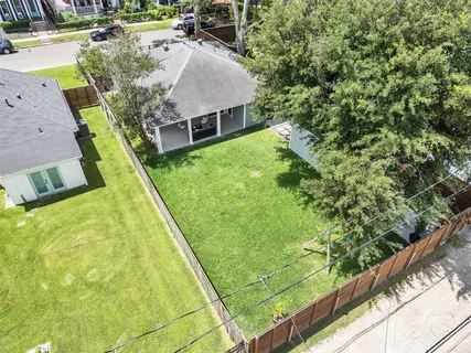 a aerial view of a house with swimming pool