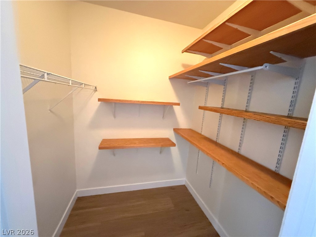 4730 East Craig Road, Unit 1164 Las Vegas, NV 89115 - Photo 11 of 14 Discover optimal organization in this well-appointed closet, featuring generous shelving and practical hanging space.