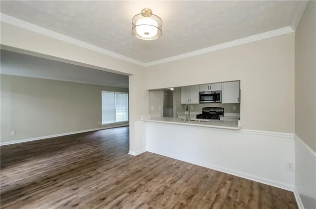 a view of kitchen and microwave