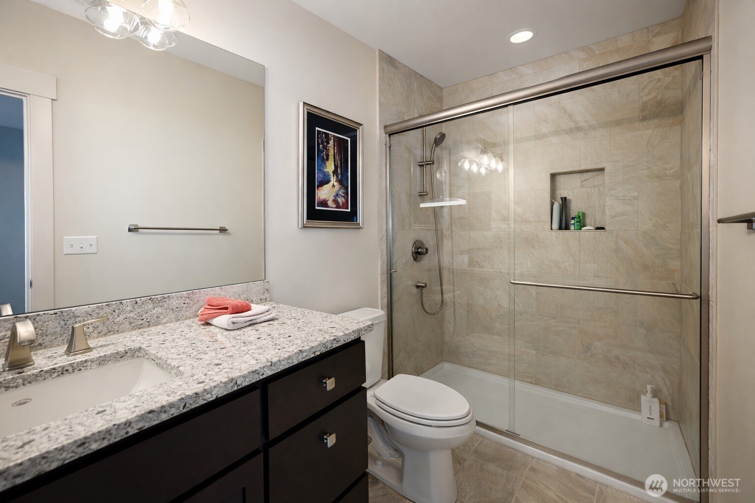 149 Clos Chevalle Road Chelan, WA 98816 - Photo 32 of 37 a bathroom with a granite countertop sink toilet and shower