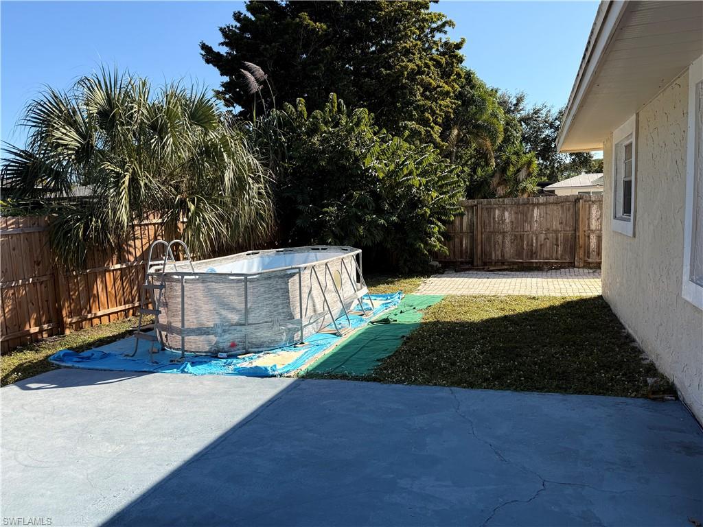 3536 Bolero Way Naples, FL 34105 - Photo 24 of 25 Fenced backyard with a patio area