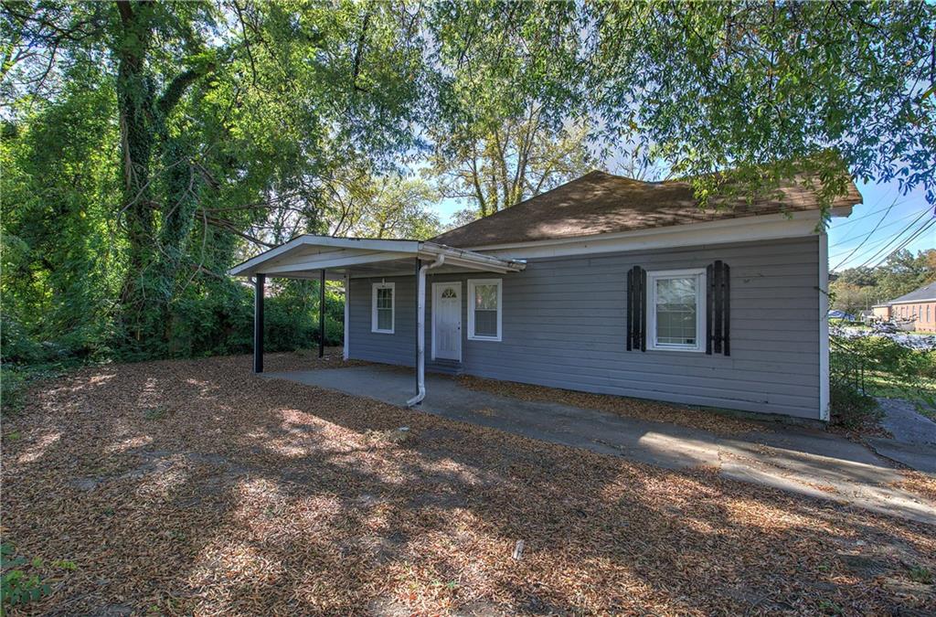 3 Grover Street Southwest Rome, GA 30161 - Photo 19 of 19 a front view of a house with a garden