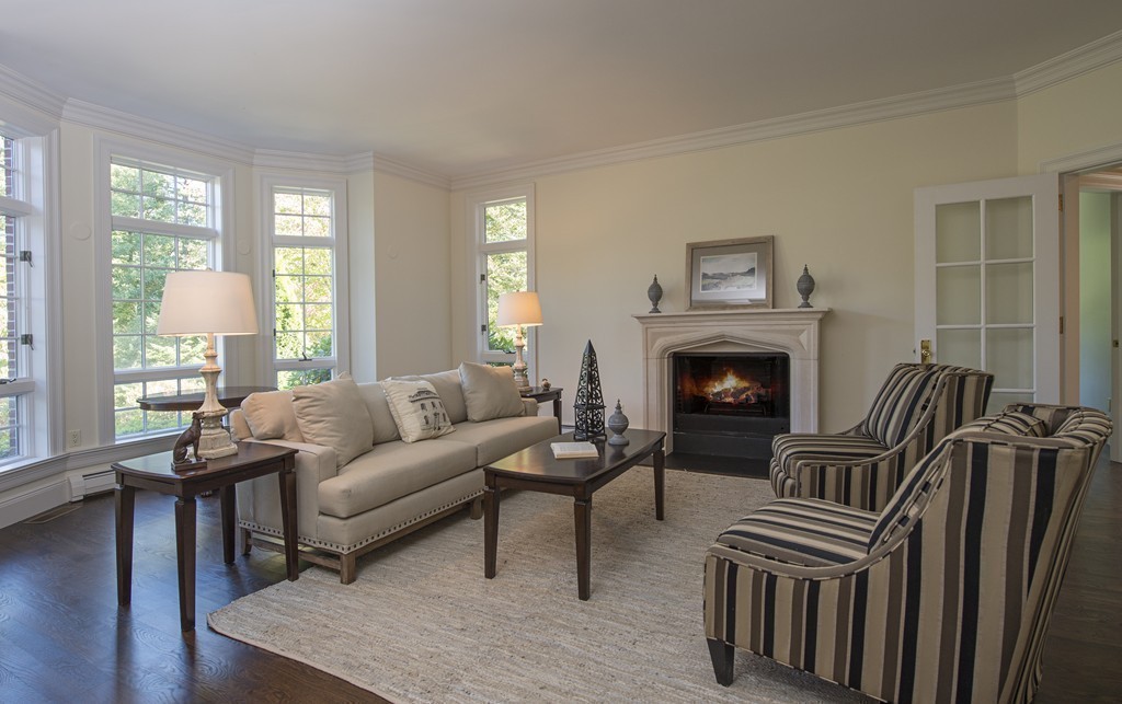 70 Black Oak Road Weston, MA 02493 - Photo 11 of 23 a living room with furniture and a fireplace