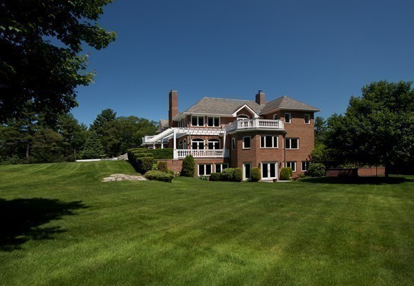 70 Black Oak Road Weston, MA 02493 - Photo 18 of 23 a front view of a house with a garden