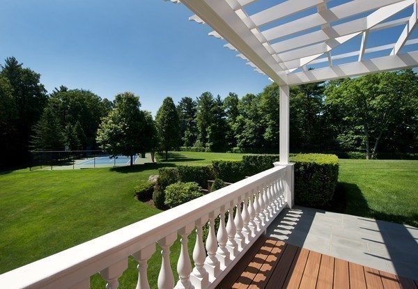 70 Black Oak Road Weston, MA 02493 - Photo 20 of 23 a view of a wooden deck next to a yard