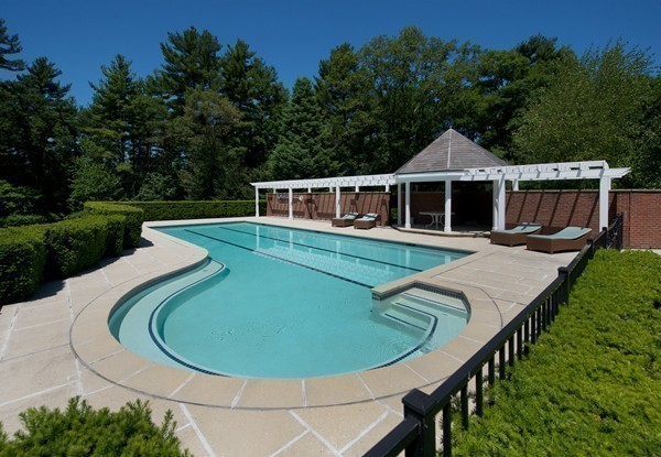 70 Black Oak Road Weston, MA 02493 - Photo 5 of 23 a view of a house with a backyard and sitting area