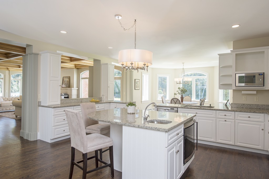70 Black Oak Road Weston, MA 02493 - Photo 7 of 23 a kitchen with center island table and chairs