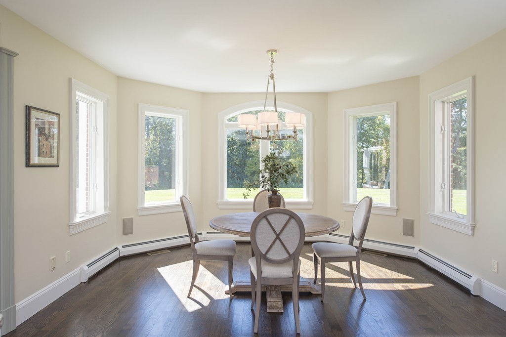 70 Black Oak Road Weston, MA 02493 - Photo 9 of 23 a view of a dining room with furniture window and wooden floor