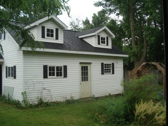 246 East Cermak Road Braidwood, IL 60408 - Photo 2 of 5 a front view of a house with a yard