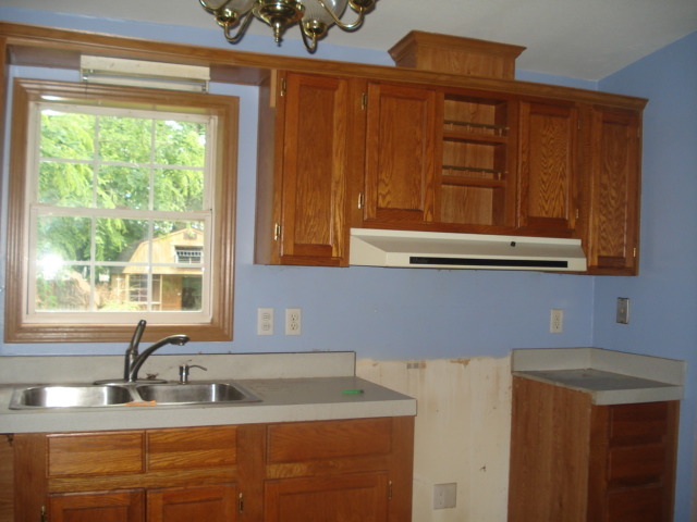 246 East Cermak Road Braidwood, IL 60408 - Photo 4 of 5 a kitchen with granite countertop cabinets sink and window