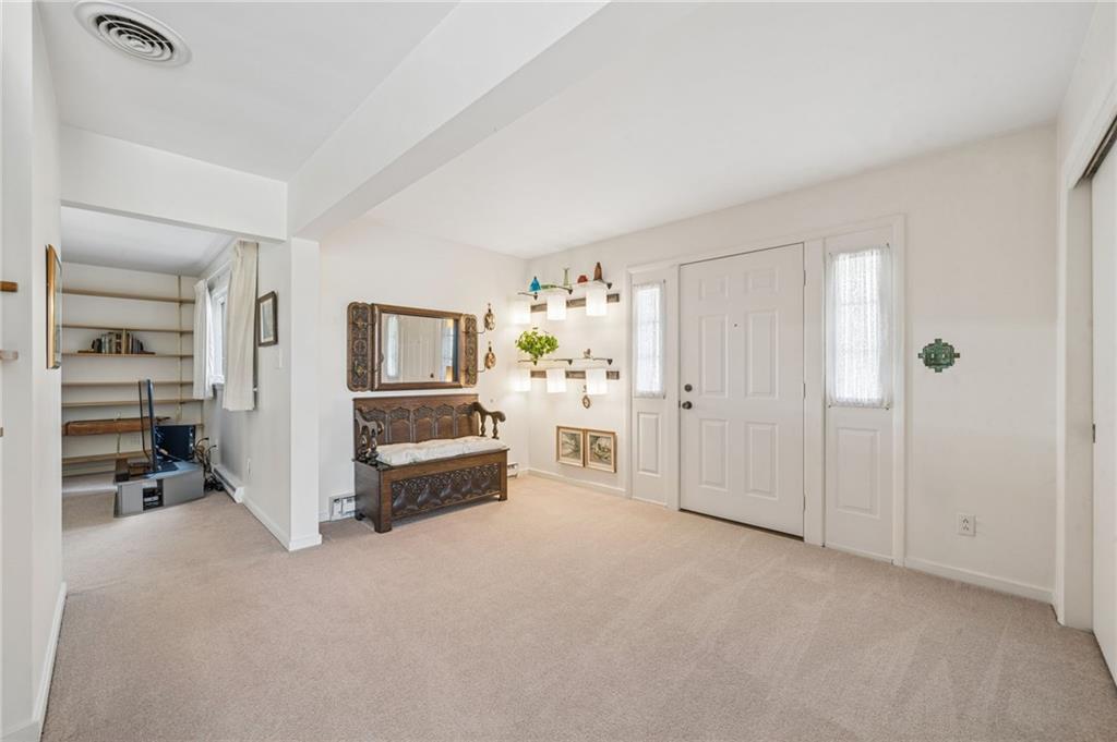 Welcome Entryway with HotelLighting Accent Wall