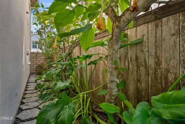 a front view of a house with parking