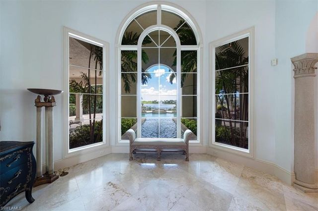 a room with furniture and a window