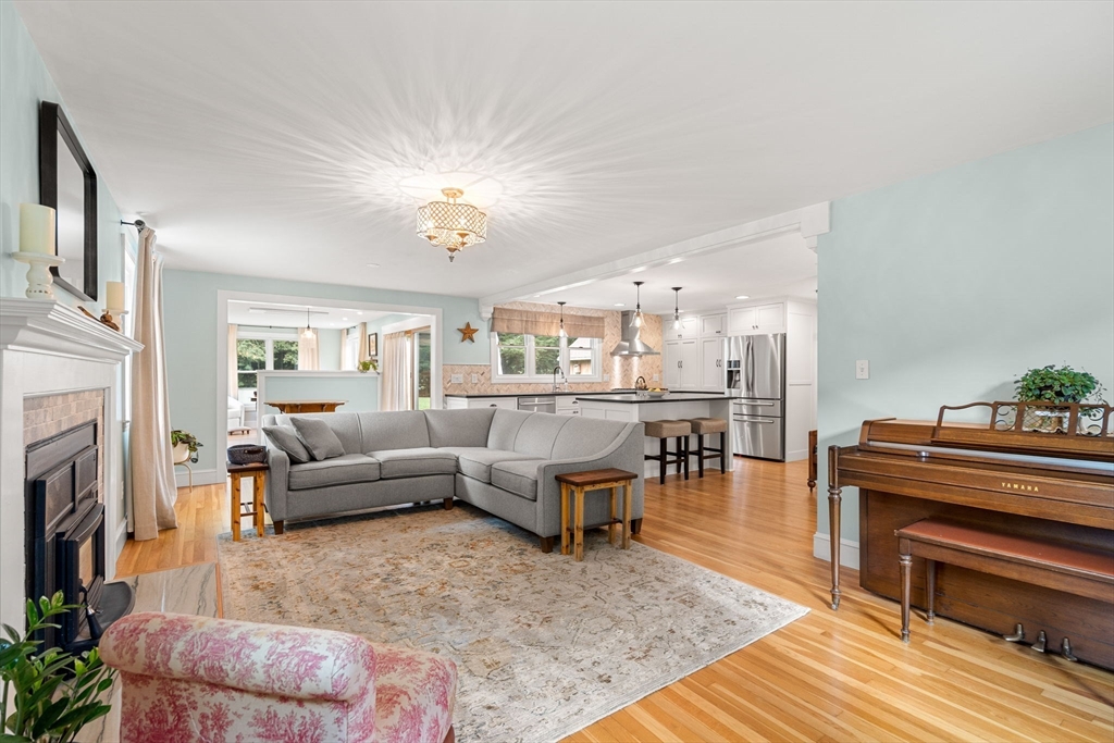19 Forrest Road Topsfield, MA 01983 - Photo 11 of 39 a living room with furniture and a fireplace
