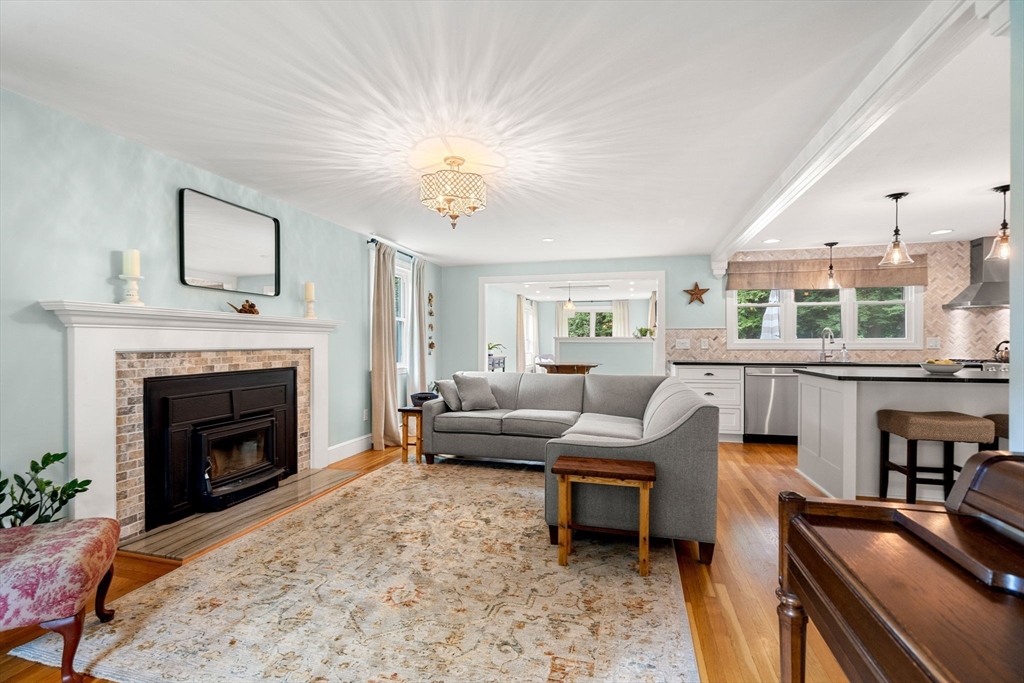 19 Forrest Road Topsfield, MA 01983 - Photo 12 of 39 a living room with furniture and a fireplace