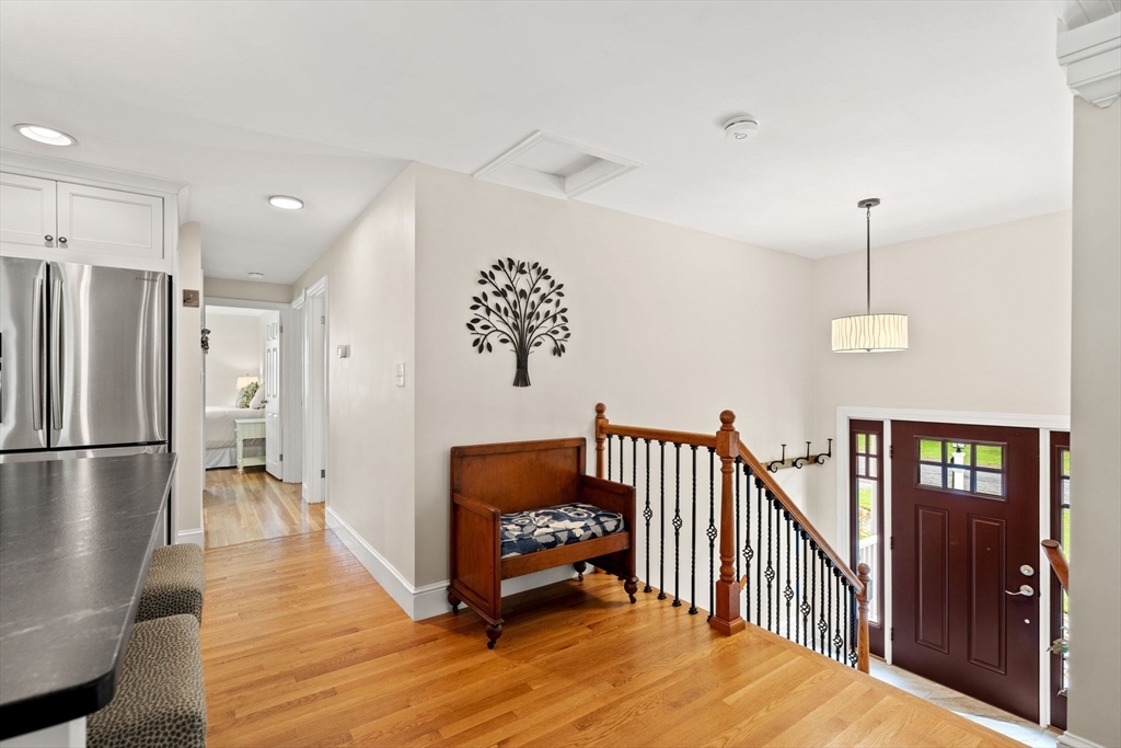 19 Forrest Road Topsfield, MA 01983 - Photo 17 of 39 a bedroom with furniture and wooden floor