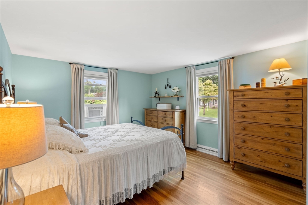 19 Forrest Road Topsfield, MA 01983 - Photo 19 of 39 a bedroom with a bed and a dresser