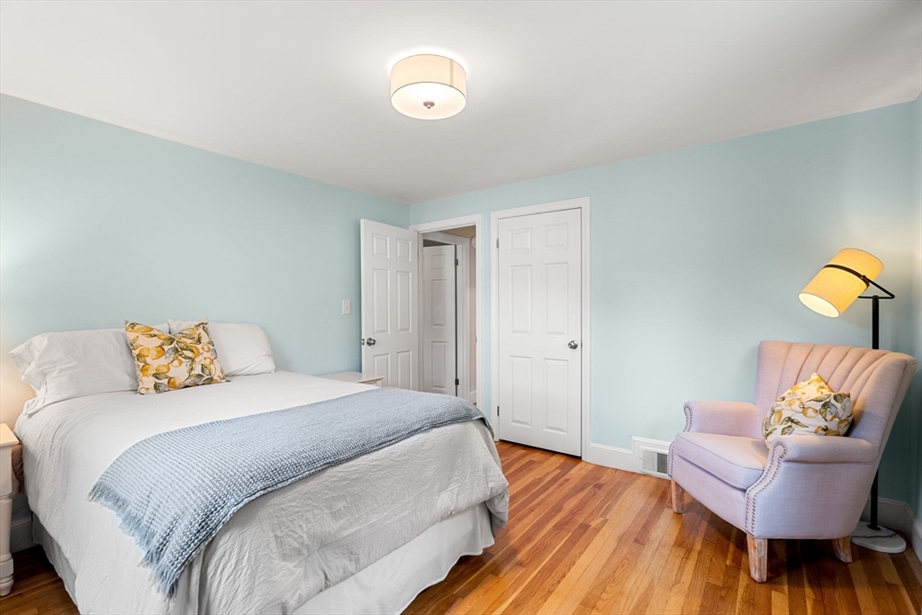 19 Forrest Road Topsfield, MA 01983 - Photo 22 of 39 a bedroom with a bed and a couch