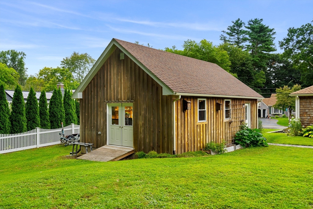 19 Forrest Road Topsfield, MA 01983 - Photo 29 of 39 a view of a house with backyard and garden