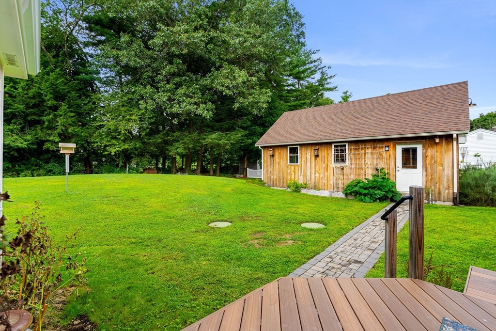 19 Forrest Road Topsfield, MA 01983 - Photo 30 of 39 a view of a house with a yard